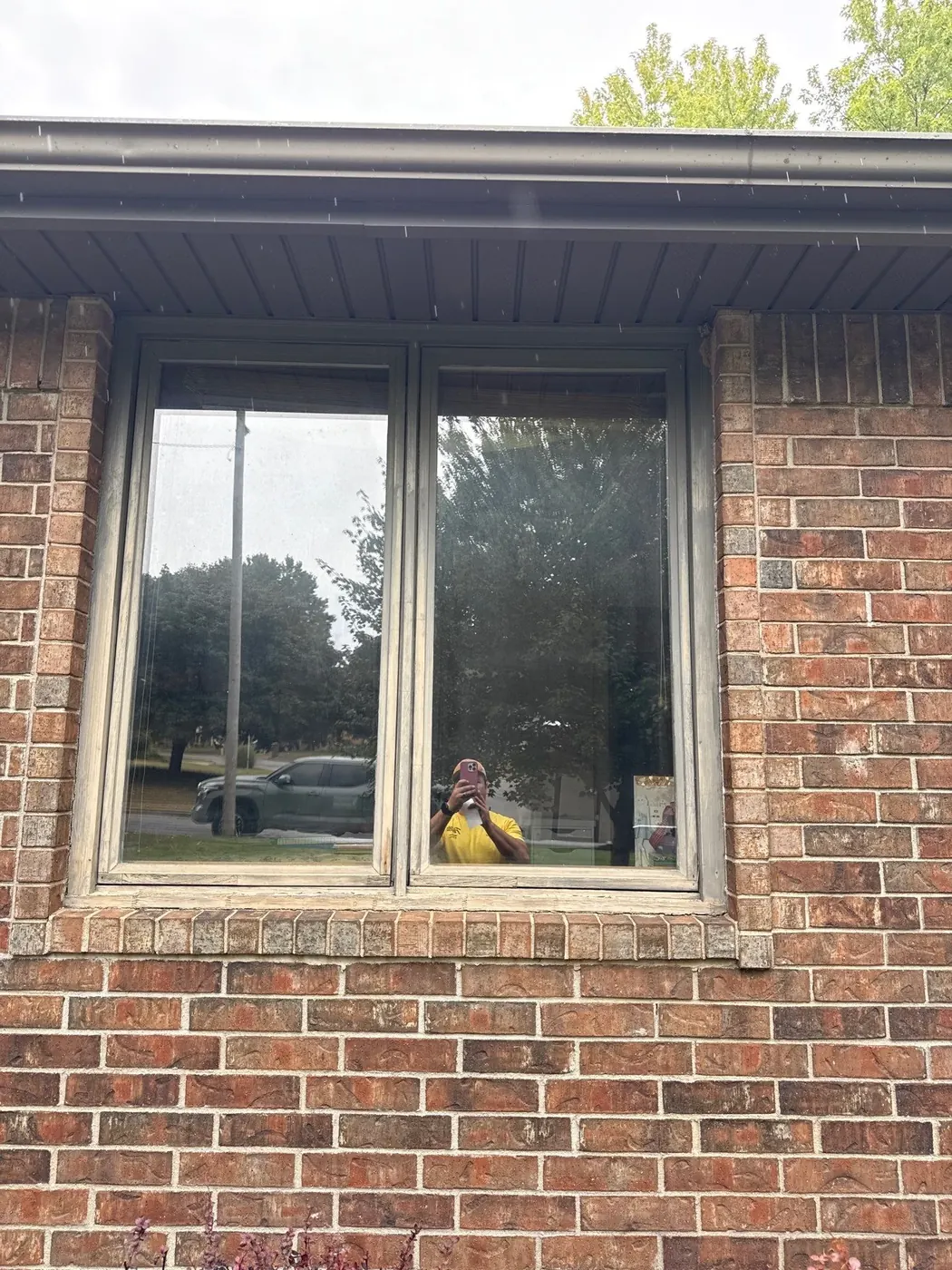 Before: the brick exterior window was ready for a more polished replacement.